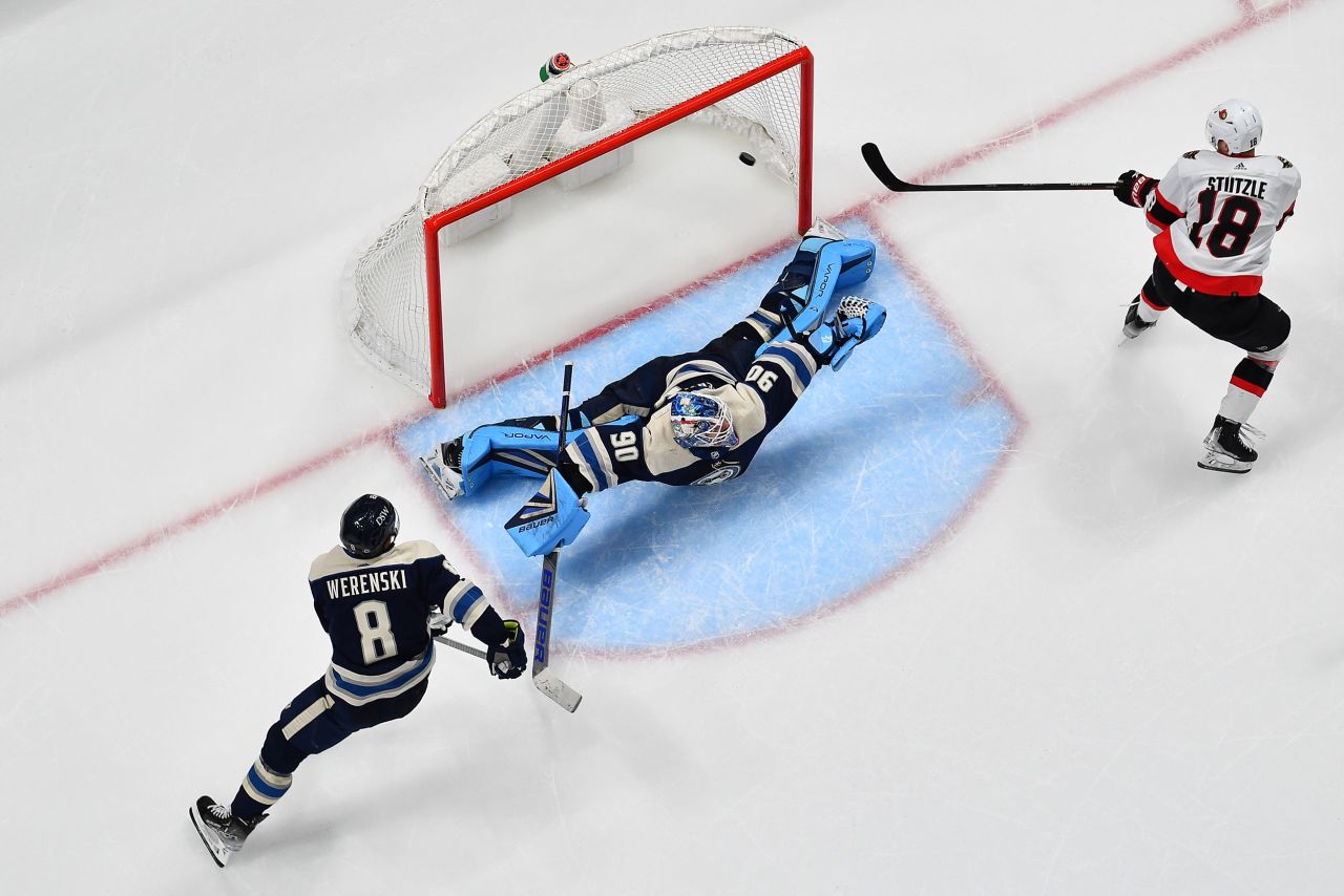 Ottawa's Tim Stutzle scores a goal past Columbus' Elvis Merzlikins during an NHL game on Sunday, January 23.