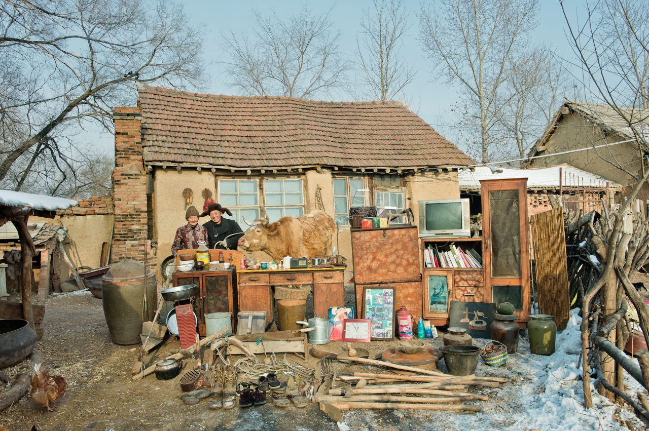 Photographer Huang Qingjun won the "Home" category with this depiction of an elderly couple standing outside their home with their possessions on display. Scroll through the gallery to see some of the winners and finalists from this year's Global SinoPhoto Awards.<br />