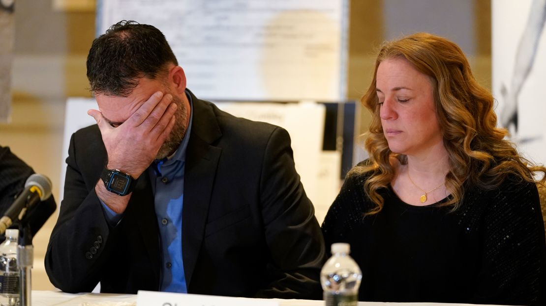 William Myre, his wife Sheri, the parents of Tate Myre, appear during a news conference in Southfield, Michigan on January 27, 2022.