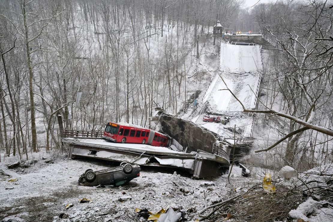 A Pittsburgh Port Authority bus that was on a bridge when it collapsed Friday is visible in the city's East End.