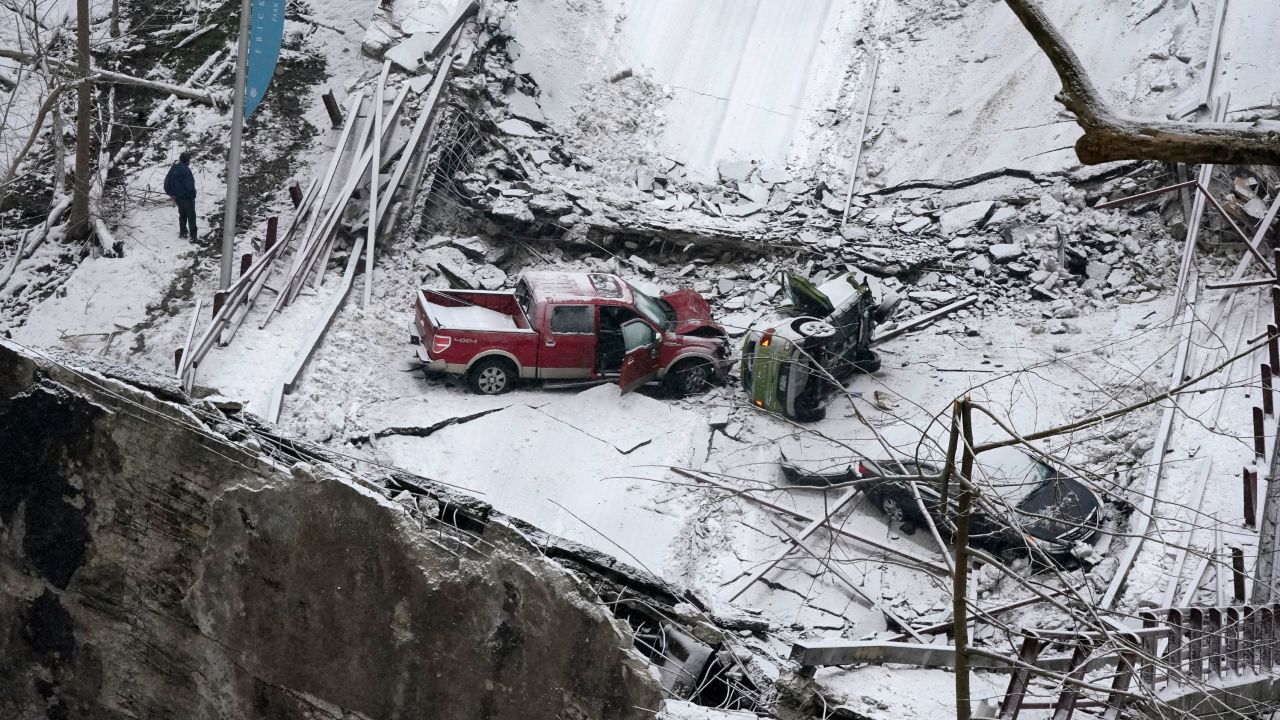 Vehicles that were on a Pittsburgh bridge when it collapsed are seen Friday morning. 