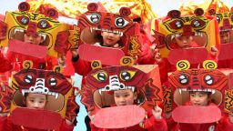 NANJING, CHINA - JANUARY 14: Kindergarten children dressed as tigers perform to welcome the Chinese New Year, the Year of the Tiger, on January 14, 2022 in Nanjing, Jiangsu Province of China. (Photo by Yang Bo/China News Service via Getty Images)