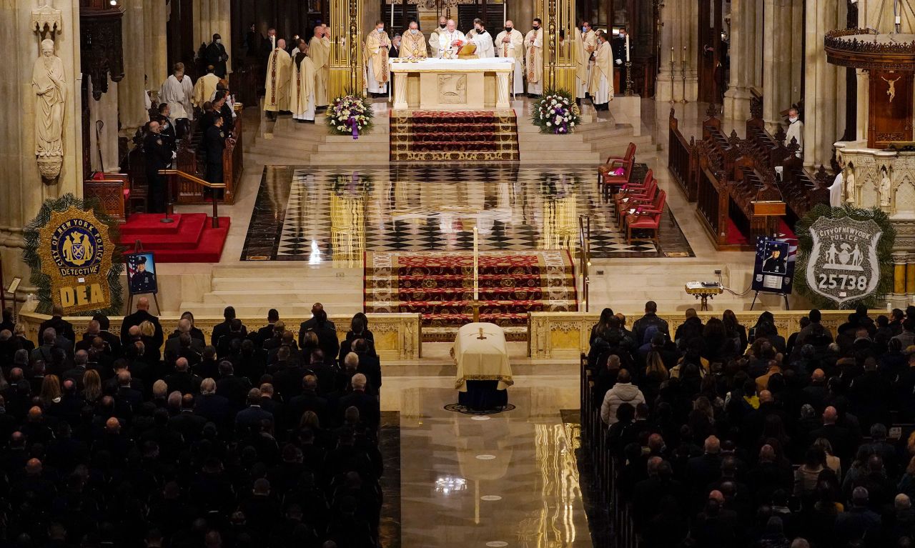 Cardinal Timothy Dolan presides over Rivera's funeral service.