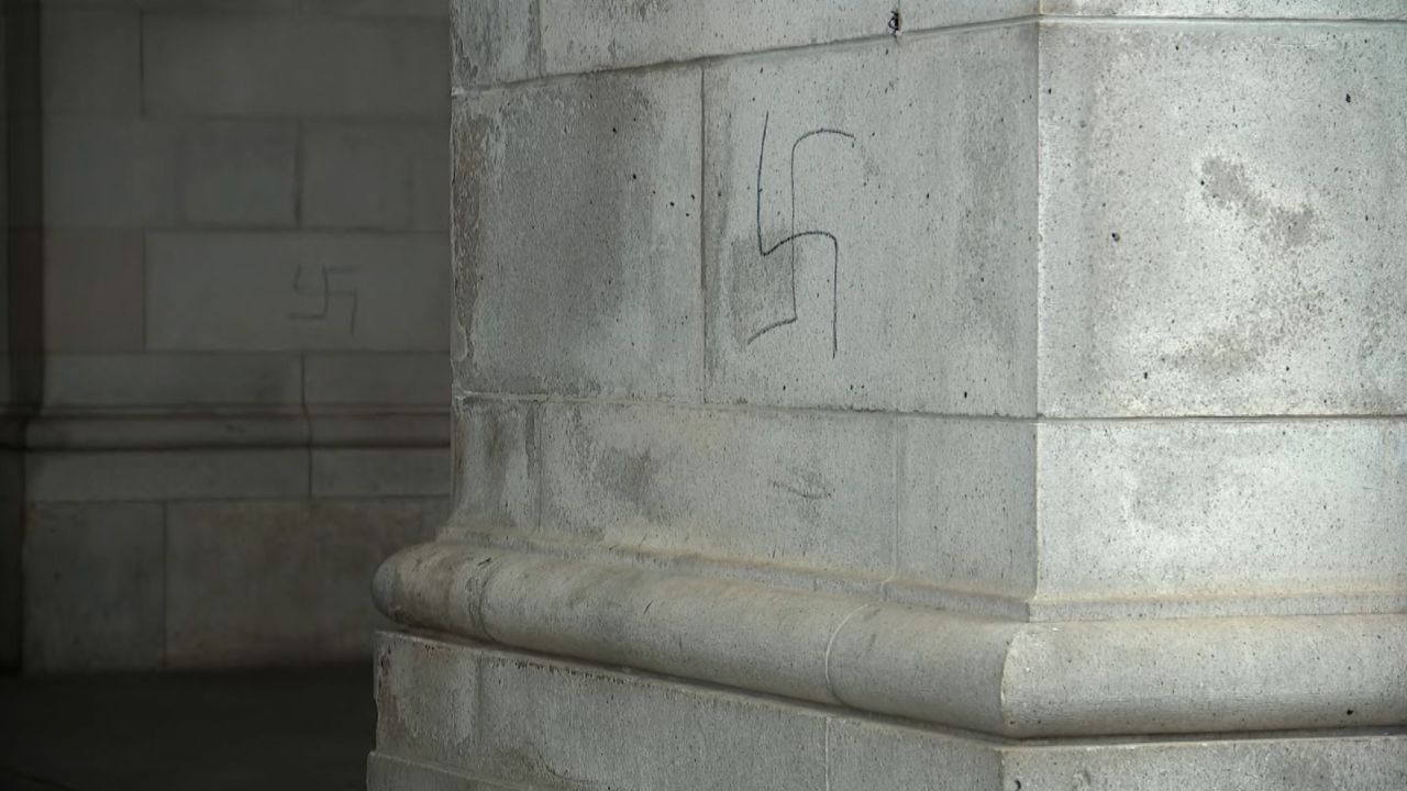 A swastika is seen painted on a column outside Union Station in Washington, DC, on January 28, 2022.