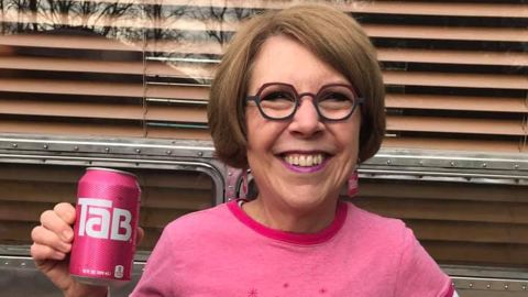 Jenny Boyter poses with a can of Tab.