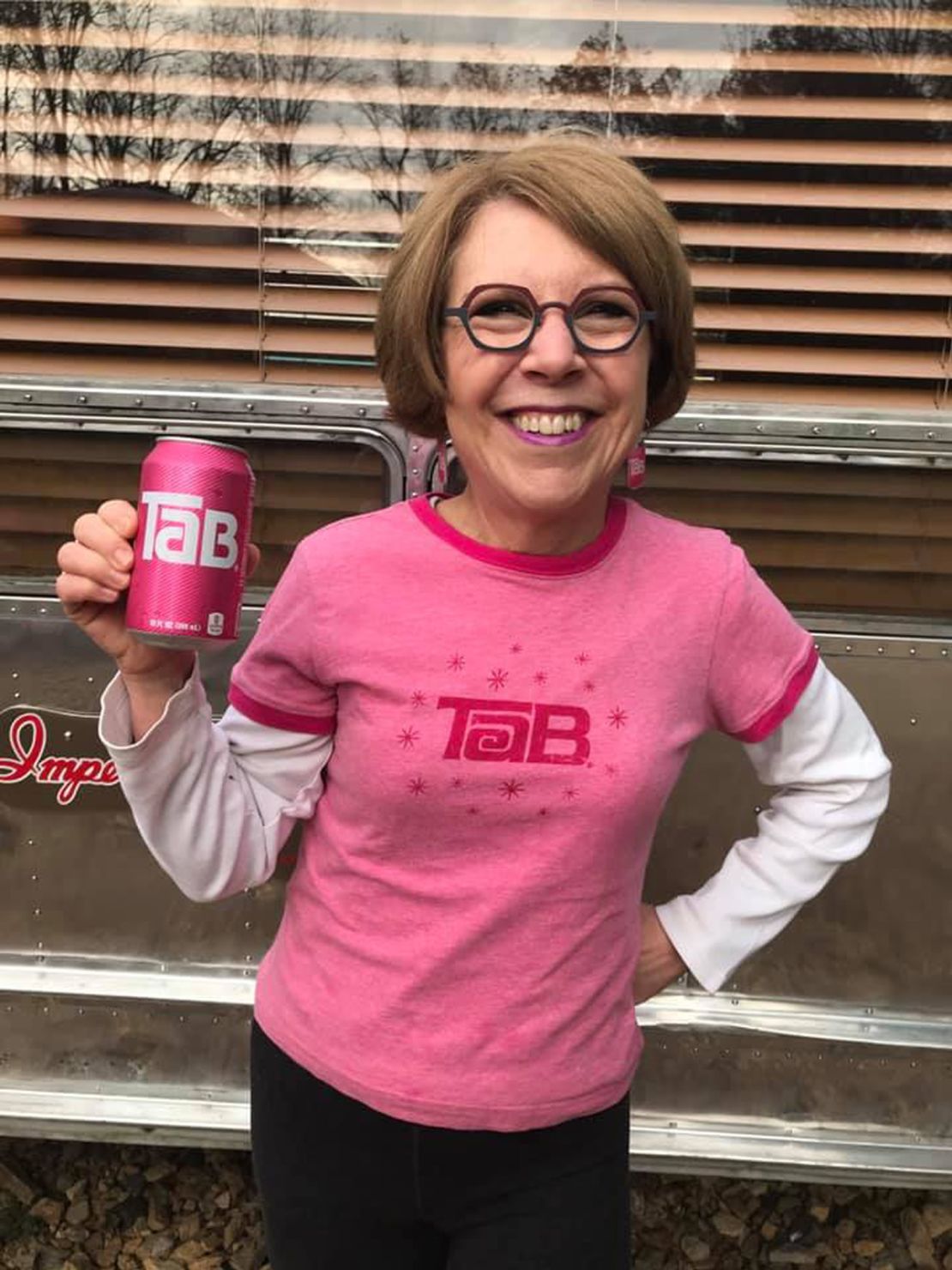 Jenny Boyter poses with a can of Tab.