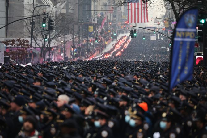 Police officers gather at St. Patrick's Cathedral for Rivera's wake.