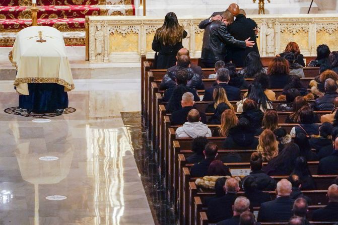 New York City Mayor Eric Adams hugs members of Rivera's family at his funeral. "We as a city, as a state, and as a nation — we say thank you, Jason. Today our hearts are with his beautiful family," Adams said at the service. "He's a hero, and our fellow New Yorkers acknowledge that."