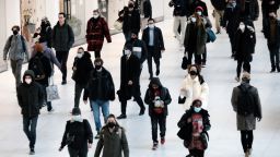 People wear masks at an indoor mall in The Oculus in lower Manhattan on the day that a mask mandate went into effect in New York on December 13, 2021 in New York City. As parts of New York are seeing a surge in Covid cases, New York Governor Kathy Hochul has enacted a new mask mandate with fines up to $1,000 per violation. 