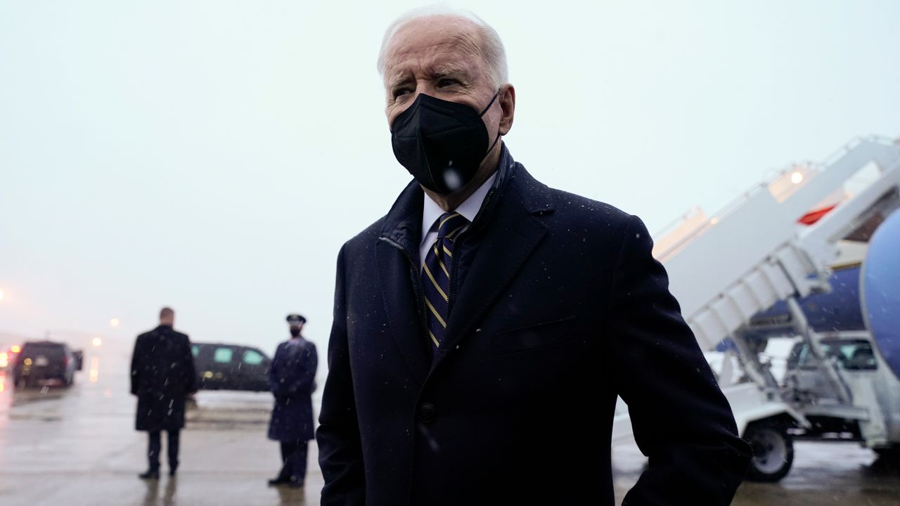 President Joe Biden speaks to reporters as he arrives at Andrews Air Force Base, Md., Friday, Jan. 28, 2022.