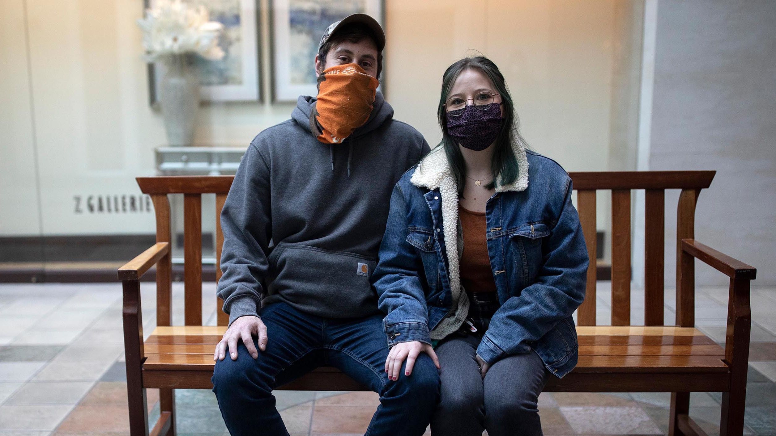 Matthew LaBelle, 28, and Heather McClintock, 24, masked up last week to run errands in a Louisville, Kentucky, mall on January 24. It's "important to stay diligent," McClintock said.