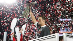 Tampa Bay Buccaneers quarterback Tom Brady (12) holds the Vince Lombardi trophy following the NFL Super Bowl 55 football game against the Kansas City Chiefs, Sunday, Feb. 7, 2021 in Tampa, Fla.