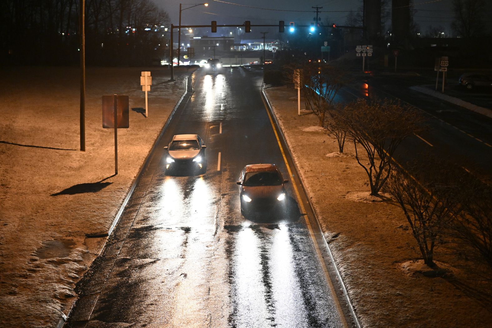 Snow falls in Charlotte, North Carolina, overnight on Friday. 