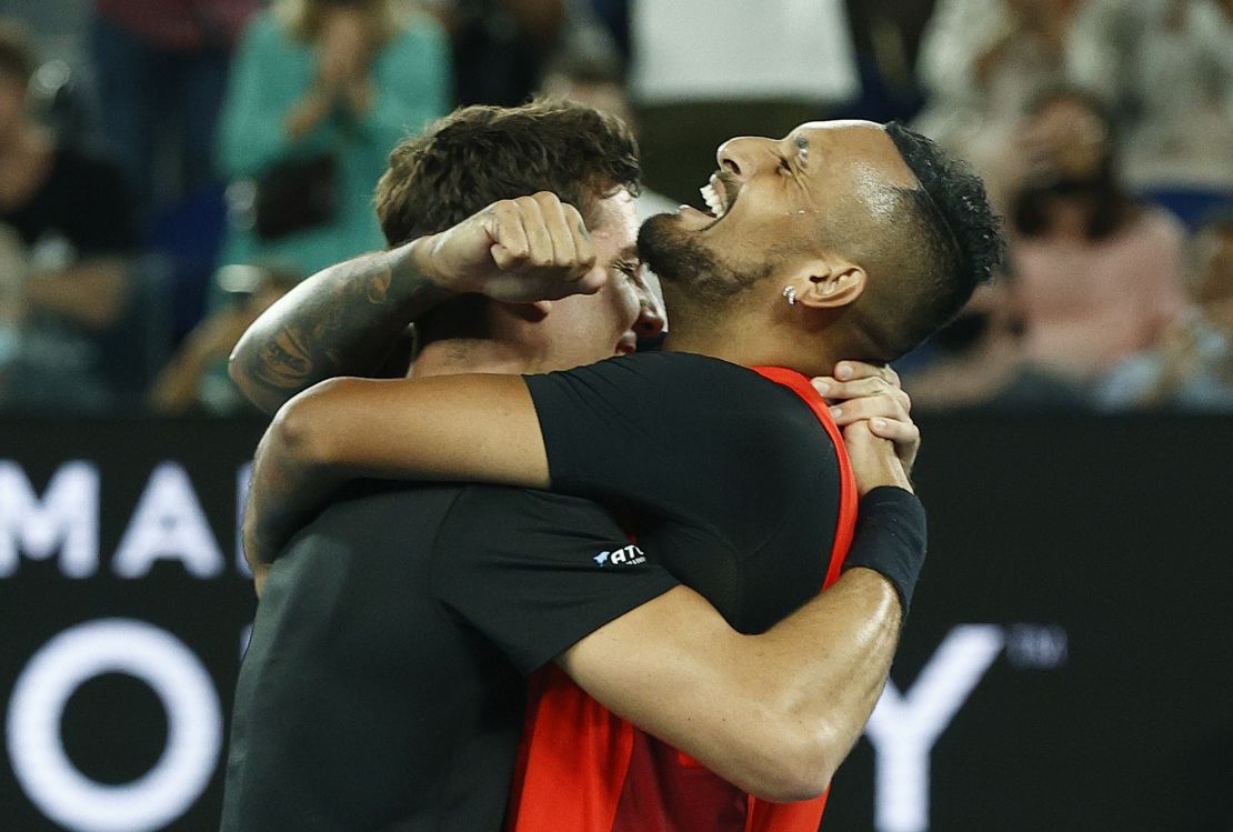 Nick Kyrgios and Thanasi Kokkinakis celebrate after winning match point.