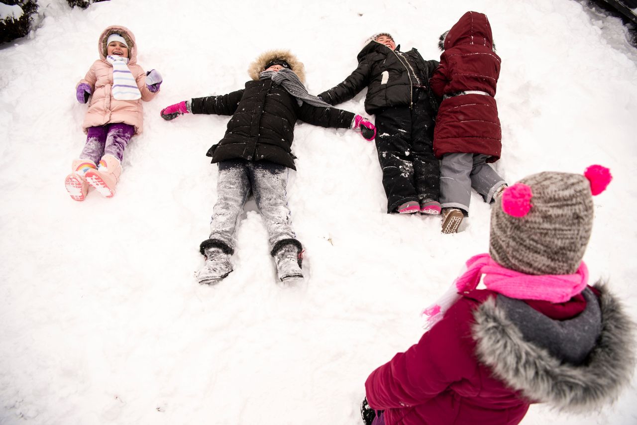 Children play in the snow in Clifton, New Jersey, on Saturday, January 29. 