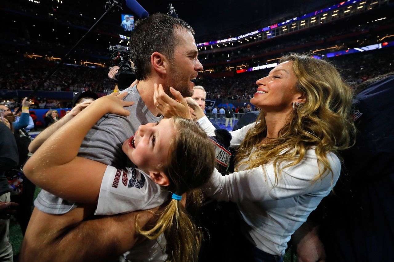Brady celebrates with his daughter, Vivian, and his wife, Gisele, after winning his sixth Super Bowl in 2019. In October 2022, Brady and Bundchen announced that they had divorced after 13 years of marriage.
