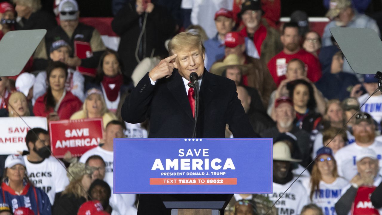 Former US President Donald Trump gestures as he speaks during a "Save America" rally in Conroe, Texas on January 29, 2022. (Photo by Mark Felix / AFP) (Photo by MARK FELIX/AFP /AFP via Getty Images)