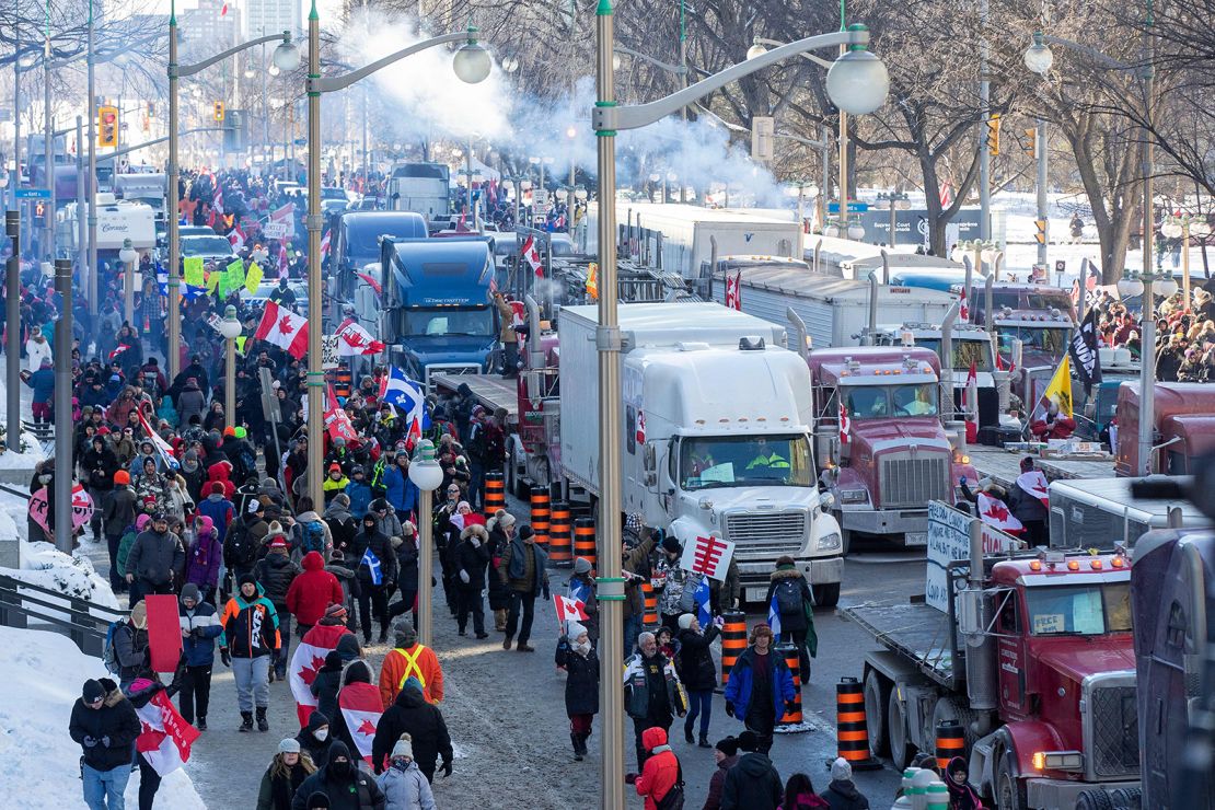 Supporters arrive at Parliament Hill Saturday for the Freedom Truck Convoy to protest Covid-19 vaccine mandates and restrictions in Ottawa, Canada.