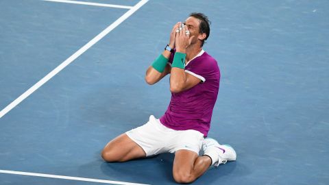 Rafael Nadal sinks to his knees after winning the Australian Open.