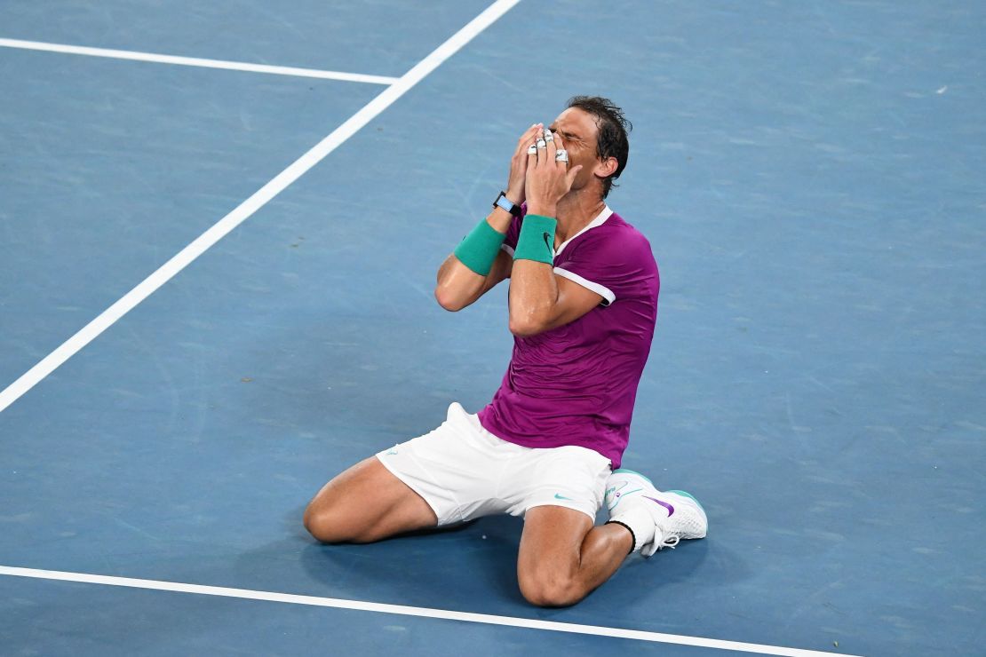 Rafael Nadal sinks to his knees after winning the Australian Open.