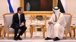 President Isaac Herzog, left, meets with the Crown Prince of Abu Dhabi, Sheikh Mohammed bin Zayed Al Nahyan, in Abu Dhabi, United Arab Emirates, Sunday, Jan. 30, 2022. Israel's president arrived in the United Arab Emirates on Sunday in the first official visit by the country's head of state, the latest sign of deepening ties between the two nations as tensions rise in the region. (Amos Ben Gershom/GPO via AP)