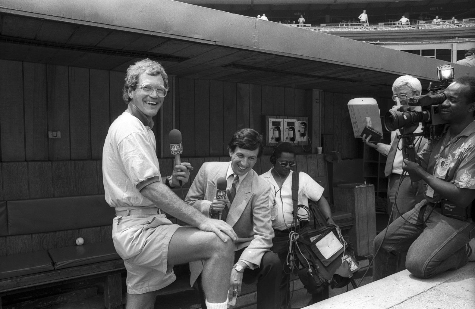 Letterman and sports commentator Marv Albert tape a segment in the New York Mets' dugout in 1988.