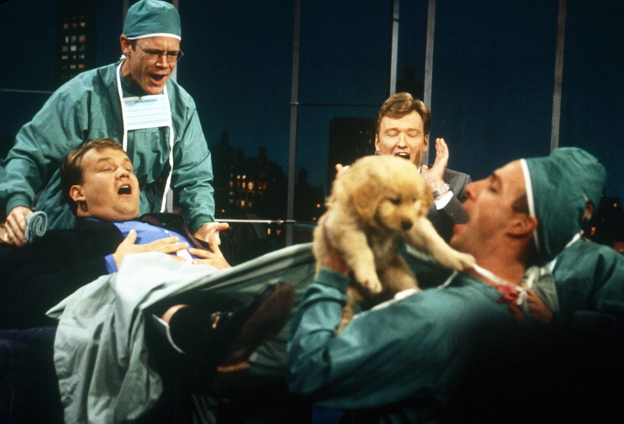 Richter appears to give birth to a puppy during a "Late Night" segment.