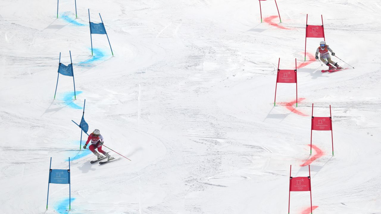 Wendy Holdener (L) of Switzerland and Hungary's Mariann Mimi Maroty compete during the Alpine Team Event at the PyeongChang 2018 Winter Games.