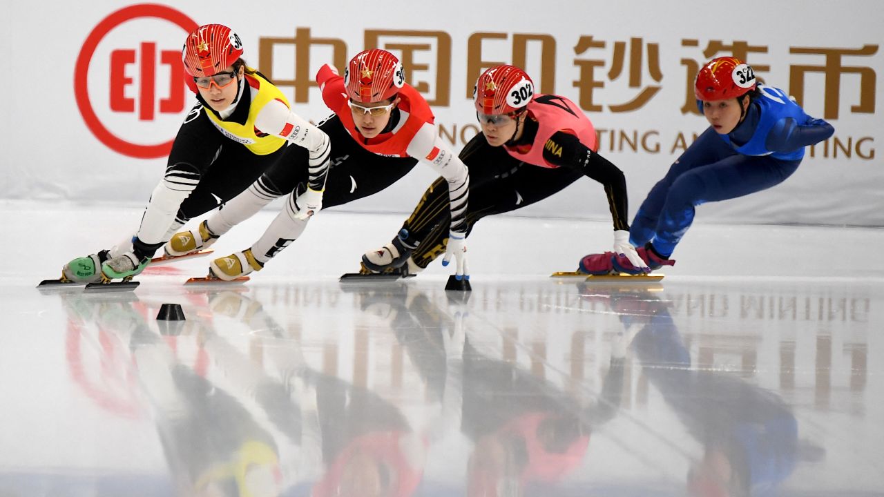 China's Li Jinyu (2nd L), PyeongChang 2018 short track speed skating 1,500m silver medalist, competes during a short track speed skating test event for Beijing 2022 in April 2021.