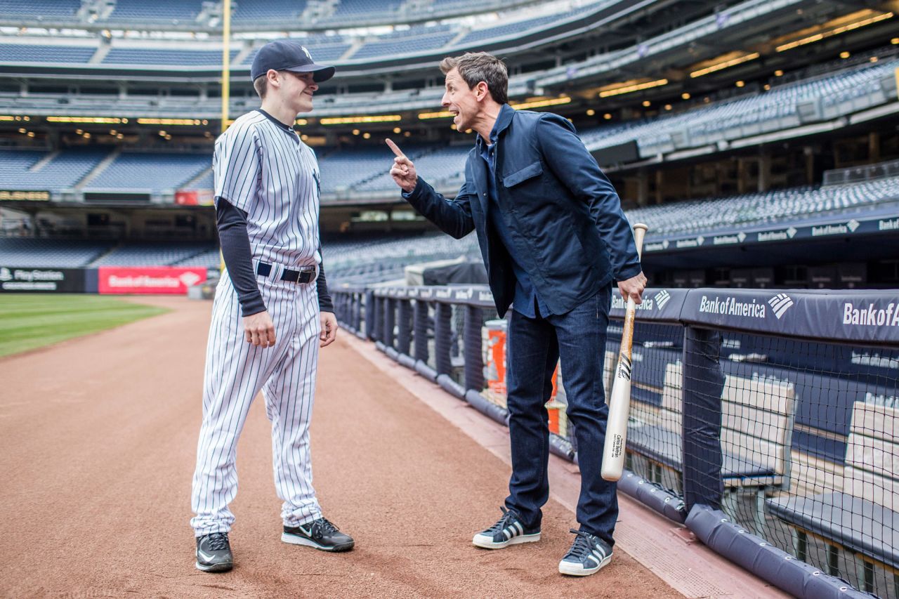 Meyers films a skit with a New York Yankees bat boy in 2015.