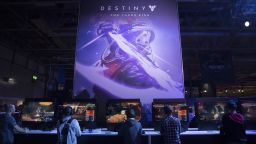 Gamers play the video game Destiny: The Taken King, developed by Bungie and published by Activision Blizzard Inc., at the EGX 2015 video gaming conference in Birmingham, U.K., on Sept. 24, 2015.