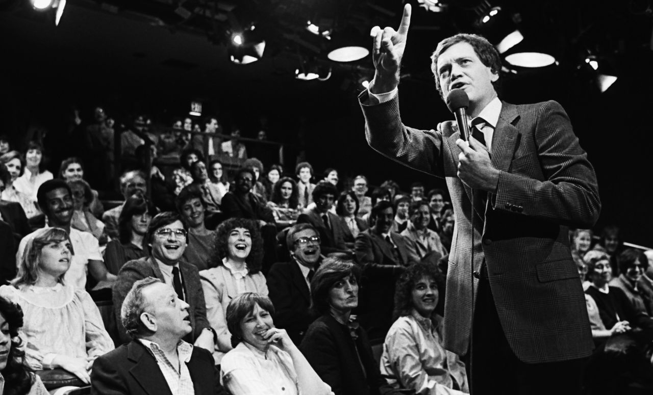 David Letterman warms up his studio audience before a "Late Night" taping in 1982. The show made its debut that year.