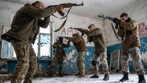 Members of Ukraine's Azov Battalion train civilians in Kyiv. The Azov Battalion started as a volunteer militia linked to far-right ideologies before it was incorporated into a National Guard unit in 2014.