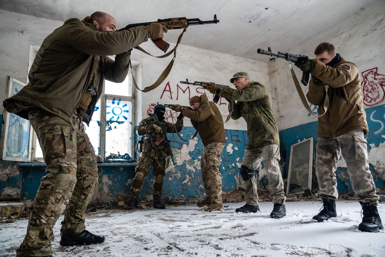Members of Ukraine's Azov Battalion train civilians in Kyiv. The Azov Battalion started as a volunteer militia linked to far-right ideologies before it was incorporated into a National Guard unit in 2014.