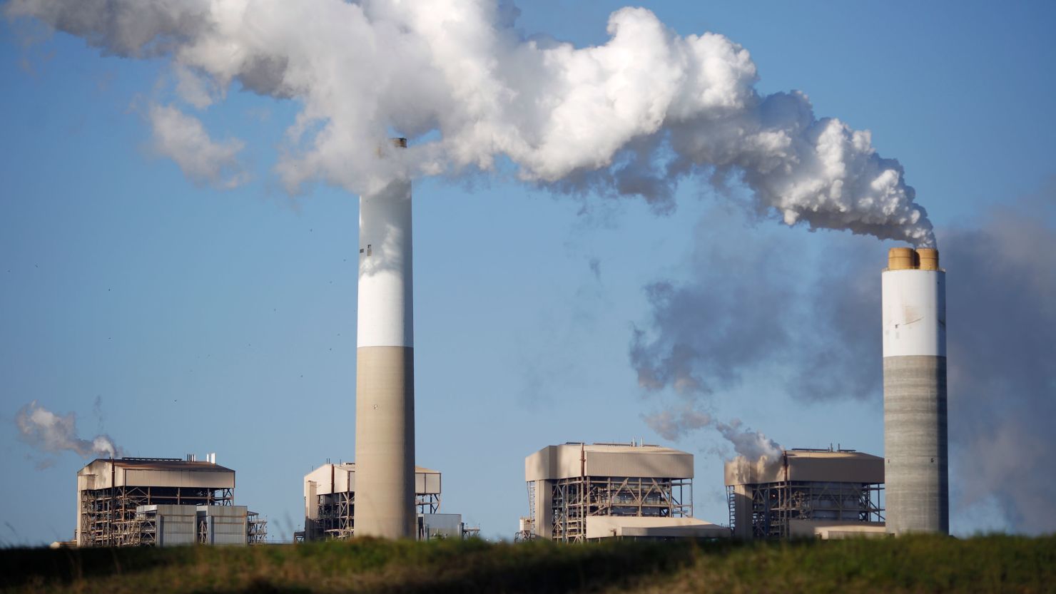 Emissions rise from the coal-fired Santee Cooper Cross Generating Station power plant in Pineville, South Carolina.