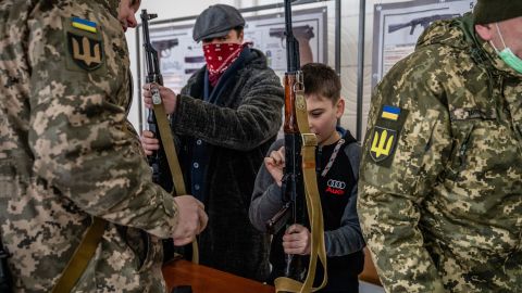 In Kharkiv, some local residents and children were given instruction on how to disassemble AK-47s.