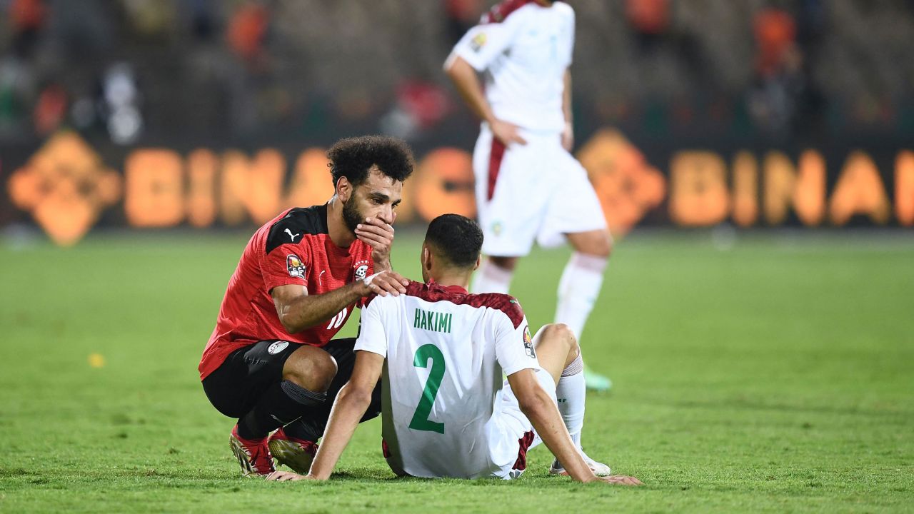 Respect between rivals: After his side's 2-1 win in the quarterfinals of the African Cup of Nations on Sunday, Egypt's Mohamed Salah consoles Morocco's Achraf Hakimi. Egypt will play hosts Cameroon in the semifinals on Thursday.