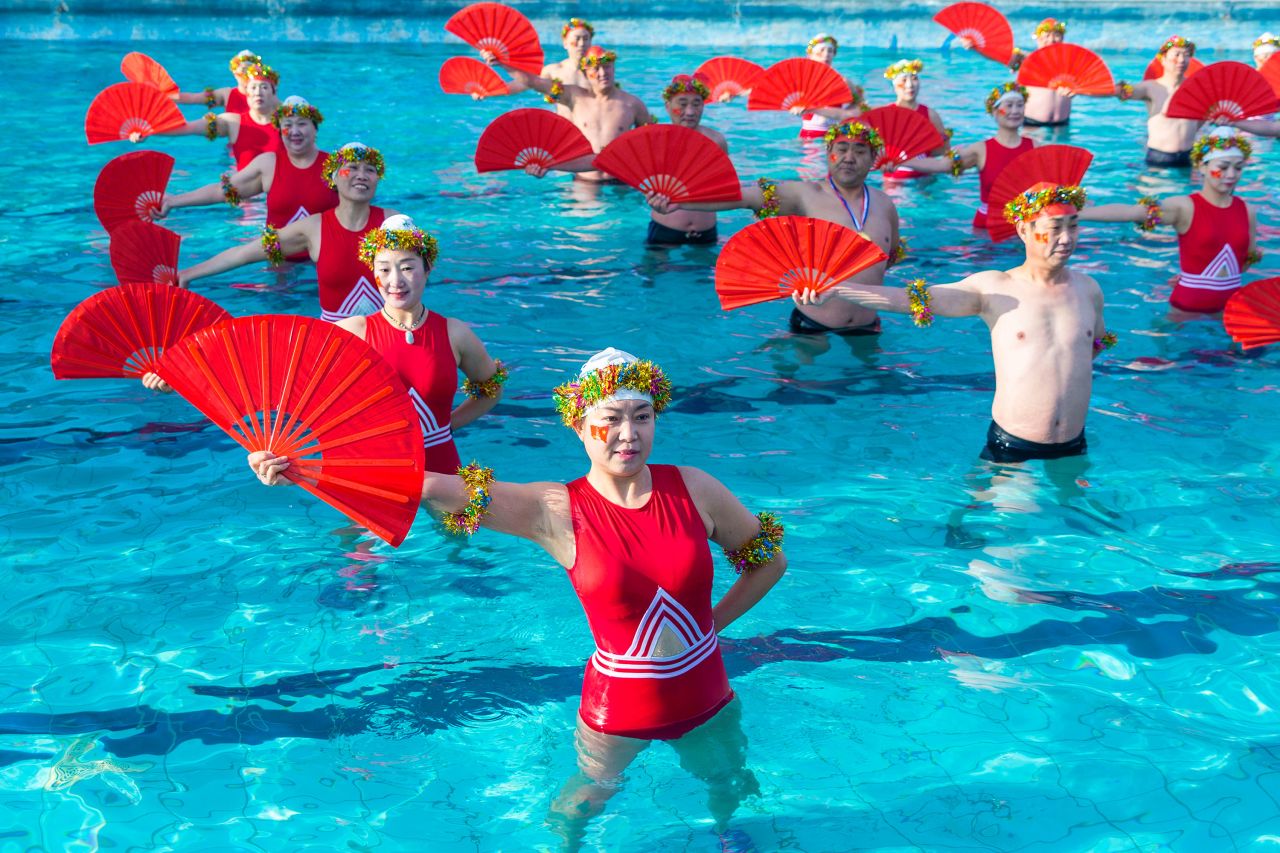 Swimmers perform a fan dance to celebrate the Lunar New Year in Yuncheng, China, on February 1.