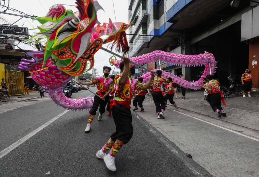 Dragon dancers perform in Quezon City, Philippines, on February 1.