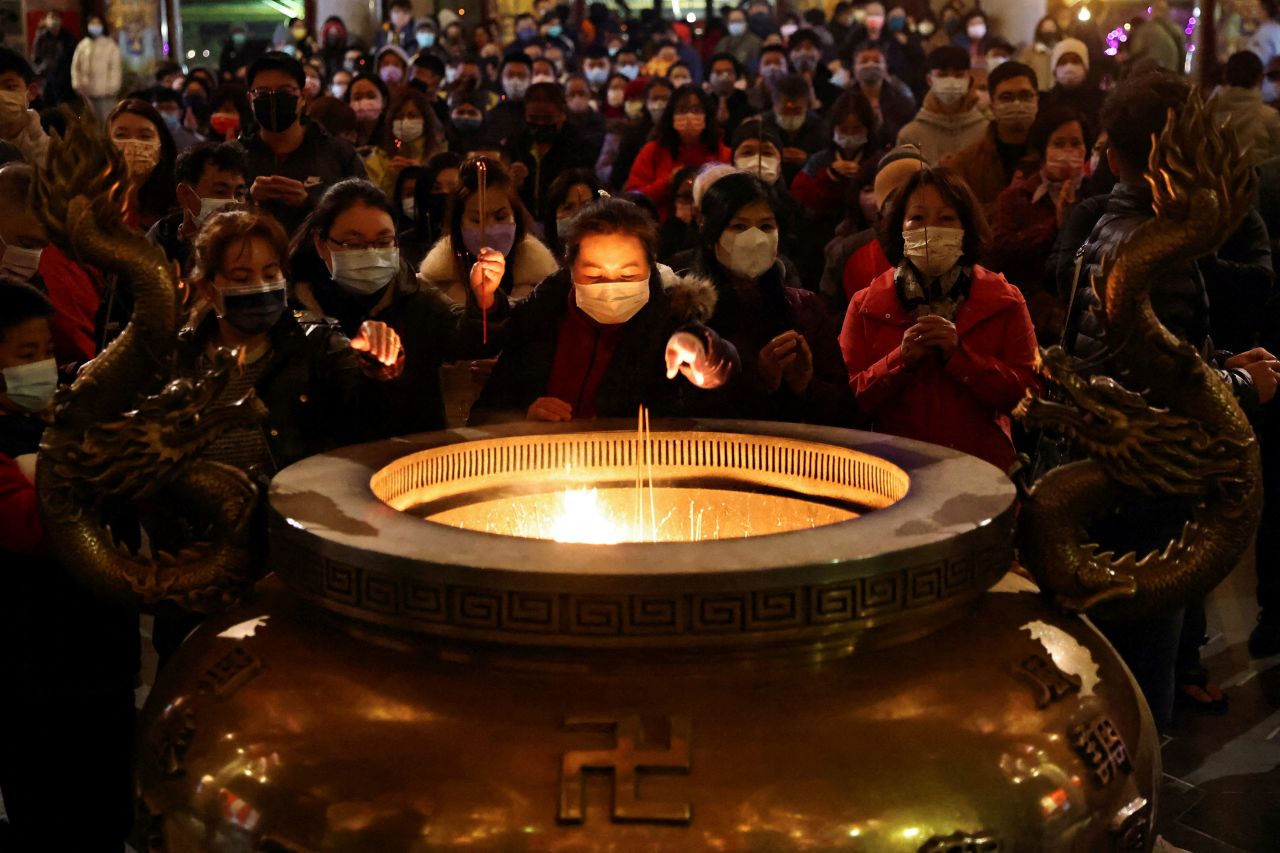 People pray at a temple in New Taipei City, Taiwan.