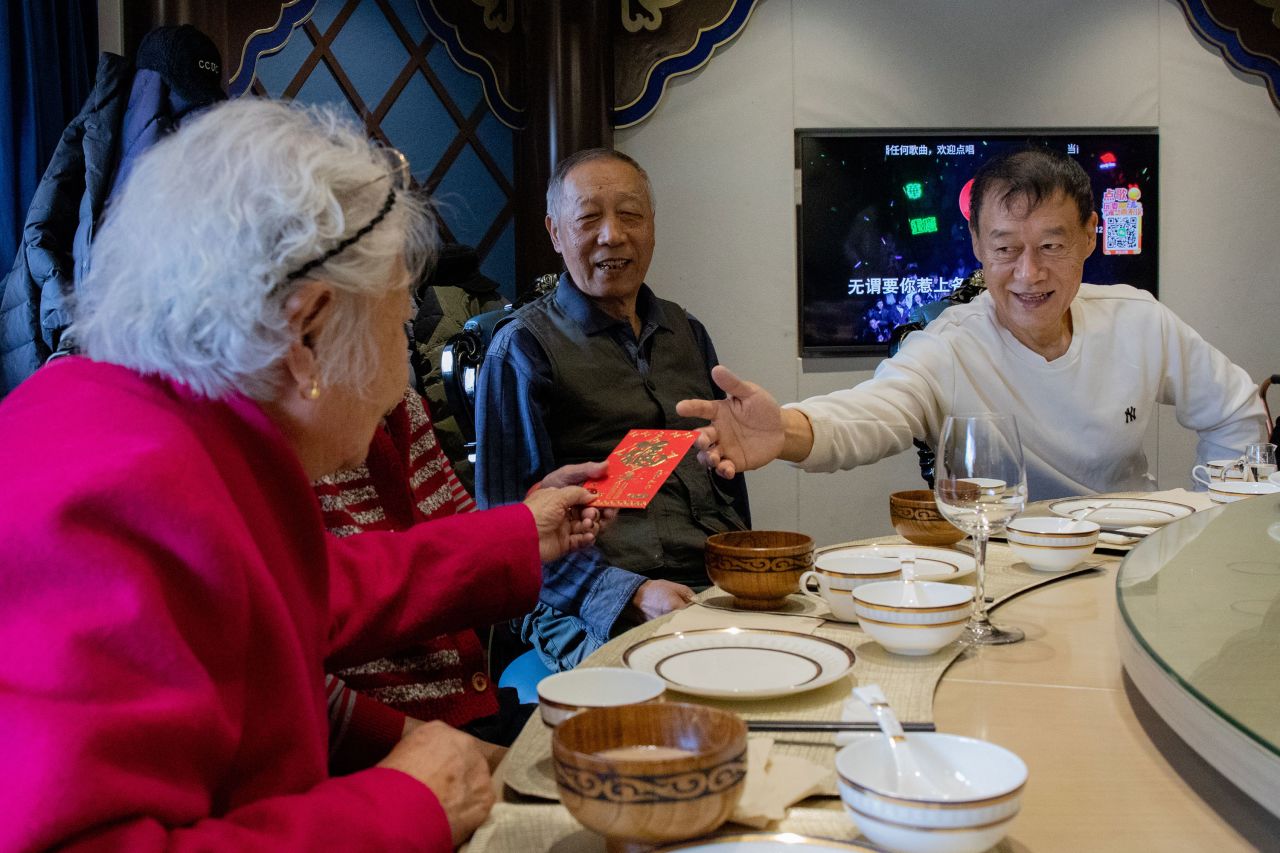 People have dinner together in Beijing on Sunday, January 30.