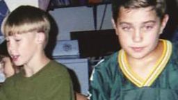 AJ Vanover in the Packers jersey and George "Rash" Adams in the green t-shirt, at a birthday party as kids.