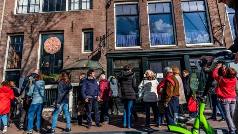 Tourists outside the Anne Frank house on April 25, 2018 in Amsterdam. 