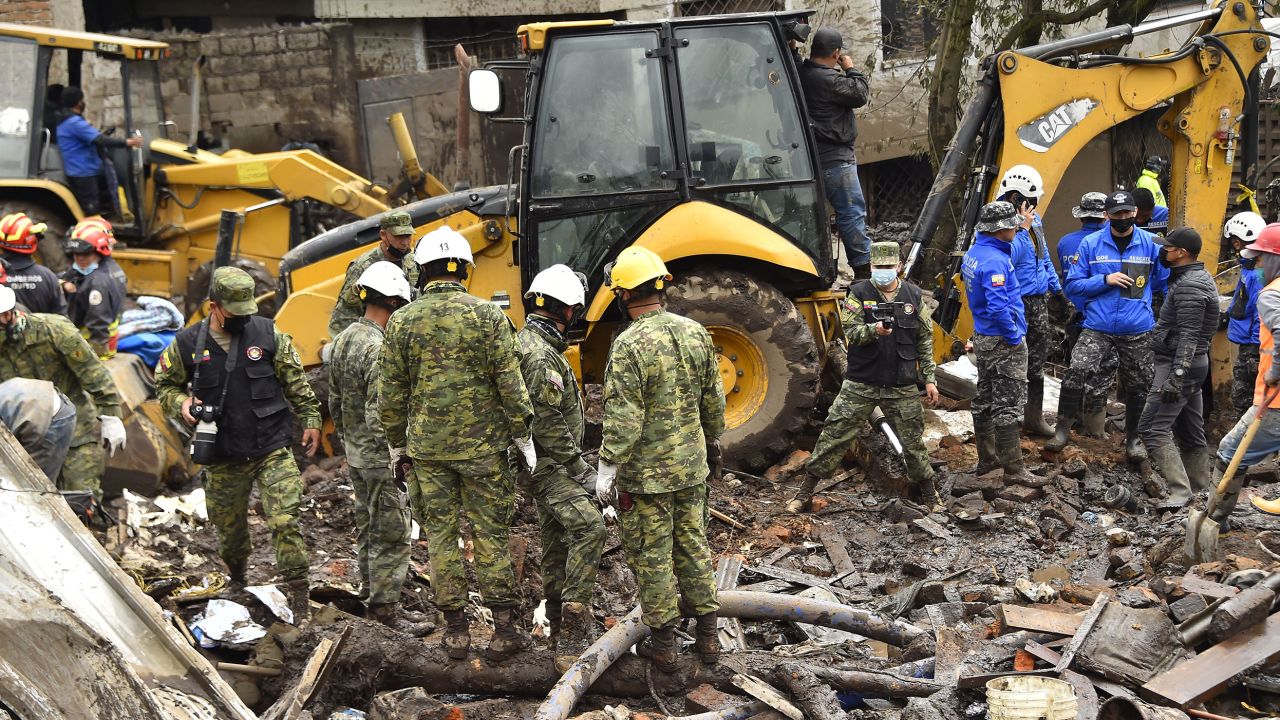 Rescue workers search for survivors after torrential rains triggered a landslide in Quito, Ecuador.