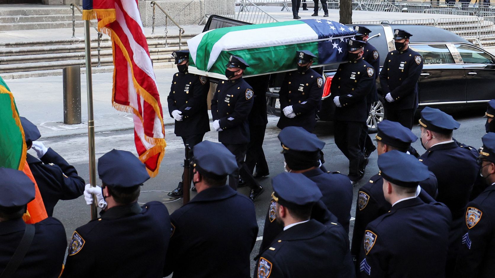 Mora's casket is carried to his wake in New York on Tuesday, February 1. 