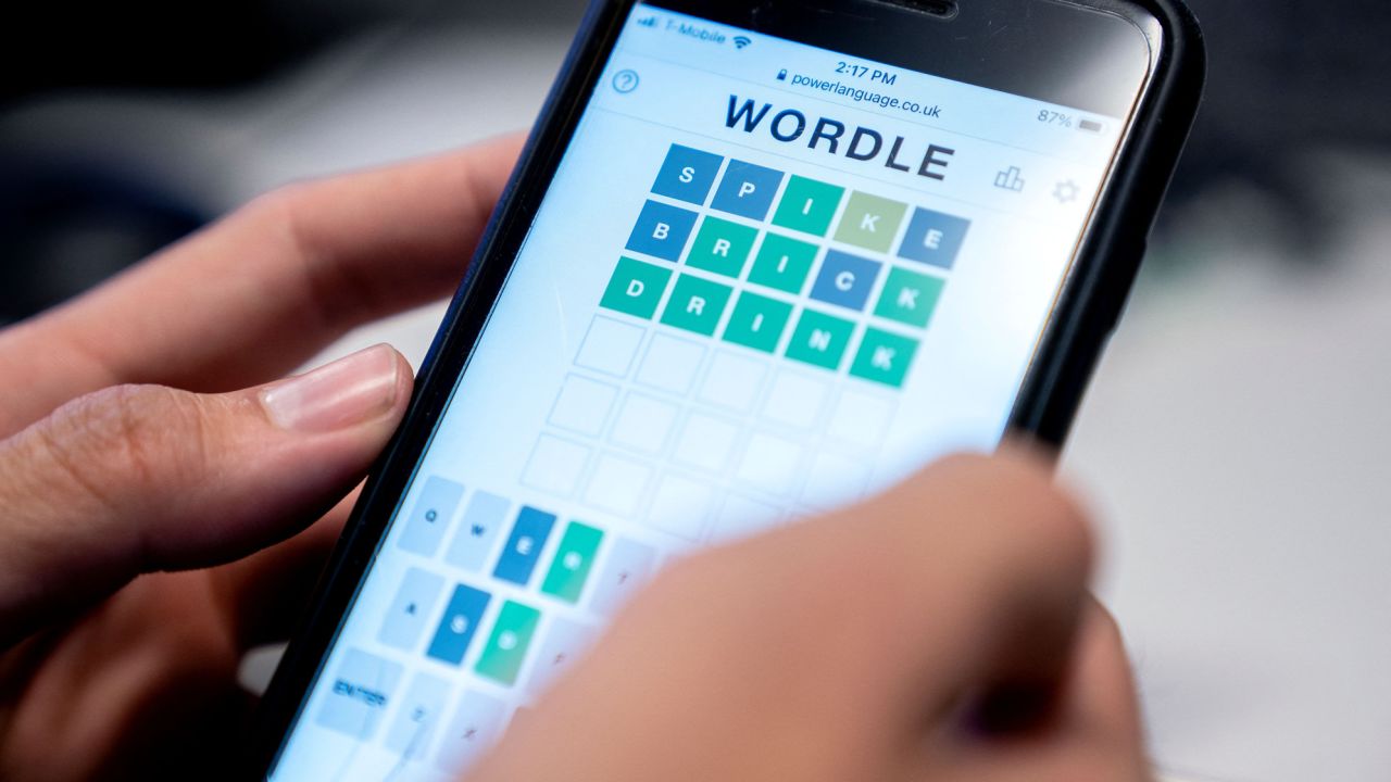 A person plays the online word game Wordle on a mobile phone on January 11.