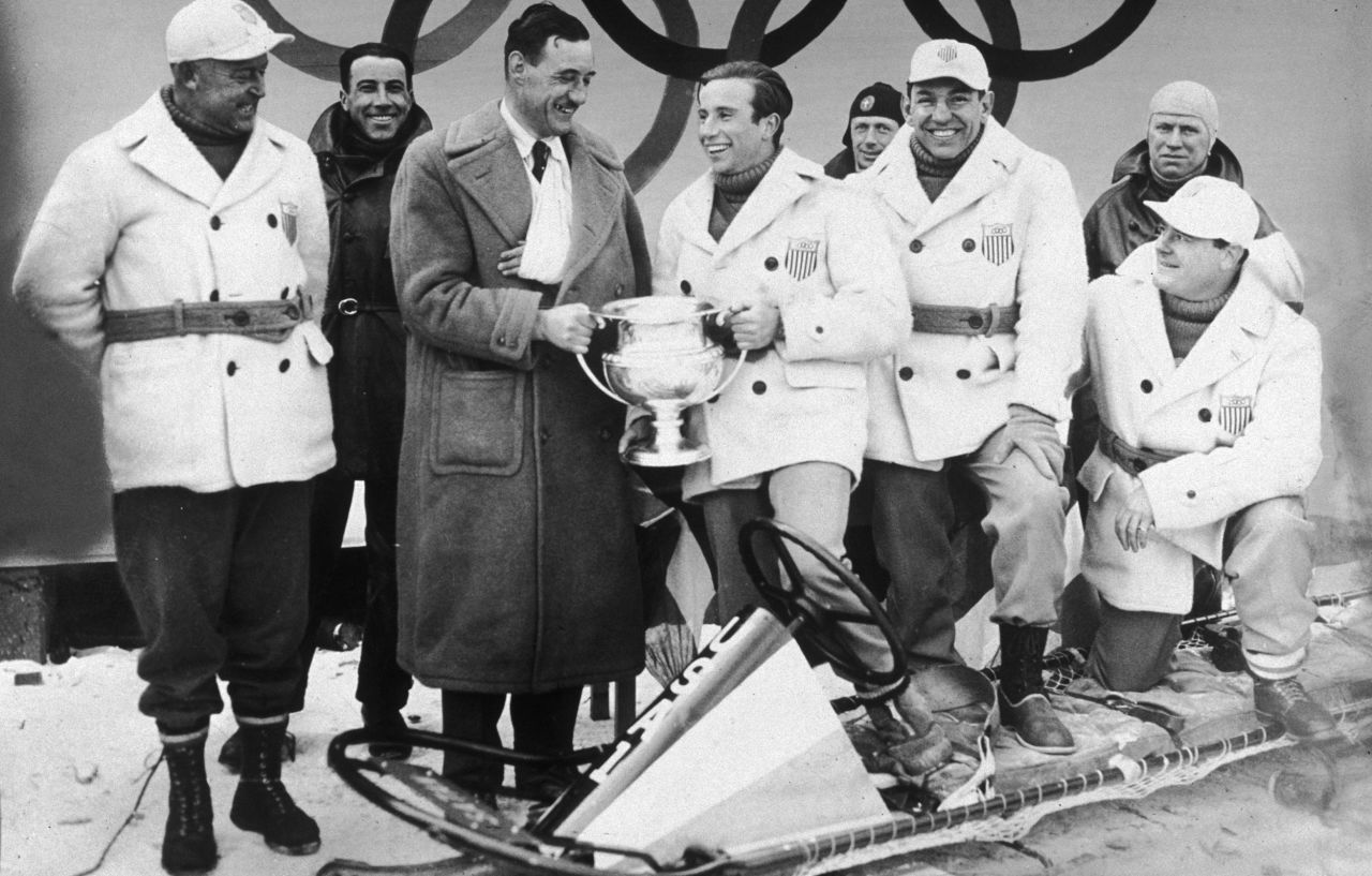 A trophy is handed to American bobsledder Billy Fiske after his team won Olympic gold in the four-man event in 1932. Eagan is next to Fiske on the right. Only Eagan and Swedish figure skater Gillis Grafström have won golds in both the Summer and Winter Olympics. Grafström's all came in one sport, though; figure skating took place during the Summer Olympics until the Winter Games began in 1924.