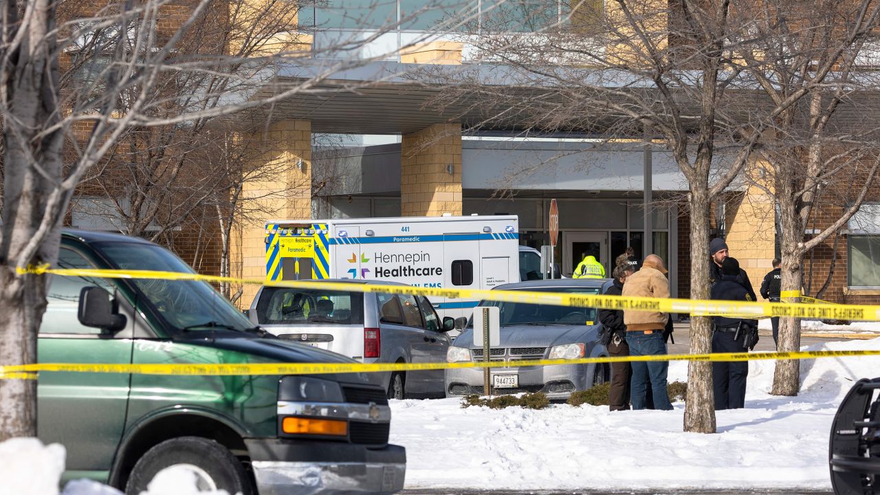 Police work in front of South Education Center in Richfield, Minnesota, on February 1, 2022.