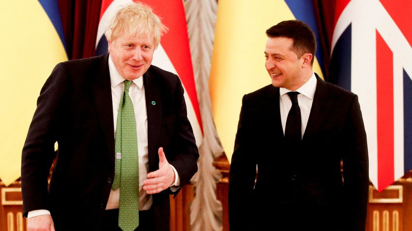 British Prime Minister Boris Johnson (L) is welcomed by Ukraine's President Volodymyr Zelensky at the Presidential Palace, in Kyiv on February 1, 2022. - Ukrainian President Volodymyr Zelensky on February 1, 2022 said Western military and diplomatic support had reached it highest level since the year Crimea was annexed, as fears swirl over a potential Russian invasion. (Photo by PETER NICHOLLS / POOL / AFP) (Photo by PETER NICHOLLS/POOL/AFP via Getty Images)