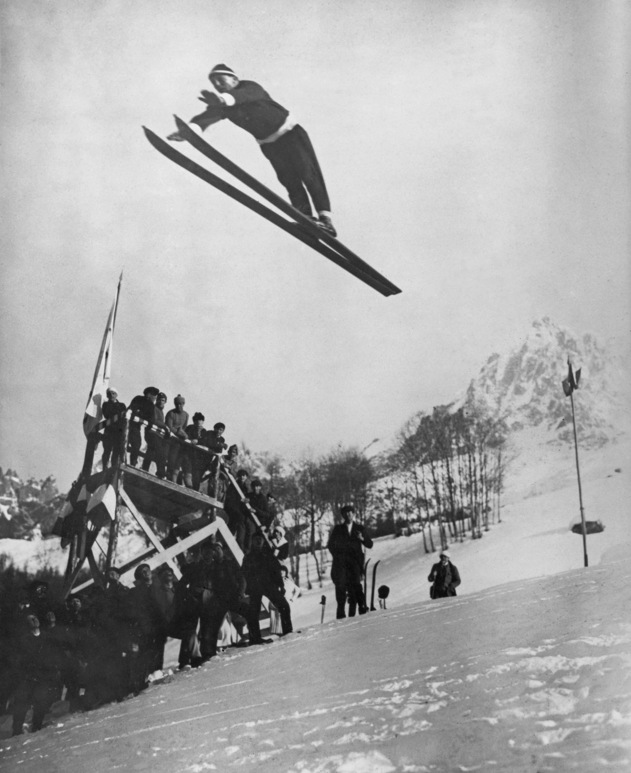 Norwegian ski jumper Jacob Tullin Thams takes flight as he competes in the first-ever Winter Olympics in 1924. He won gold in the individual large-hill event.